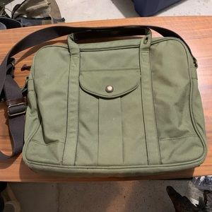 “Property Of” canvas laptop bag